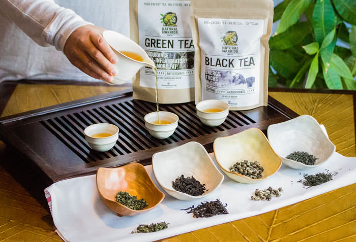 Grace pours tea into cup th