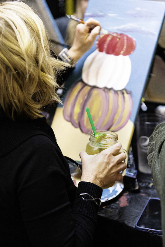 Tasty margarita enjoyed by painter at San Marcos grill.