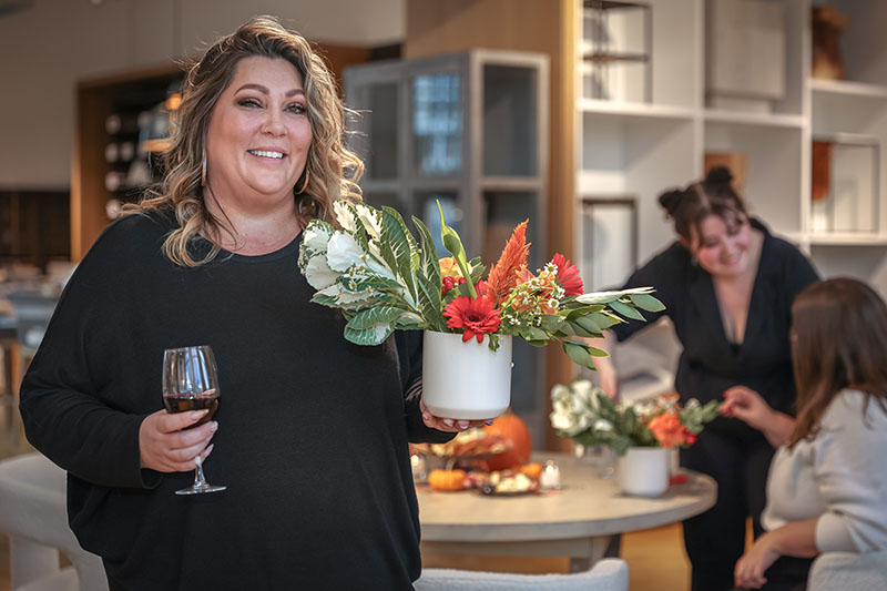 Michelle LaRoux displays the arrangement she made during an Abloom Floral Design workshop, hosted at The Paloma in Downtown Reno.